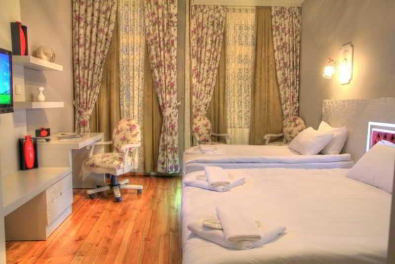 Omer Hayyam Suites Istambul Quarto foto